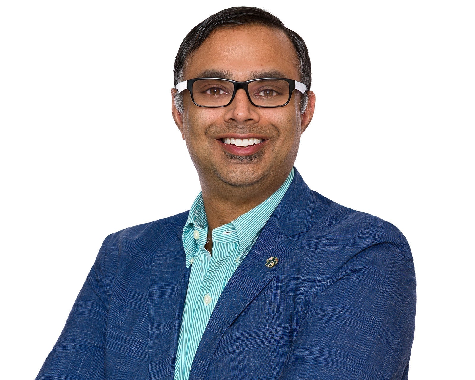 Finished corporate headshots photographed for separate Canadian client organizations on a consistent white background.